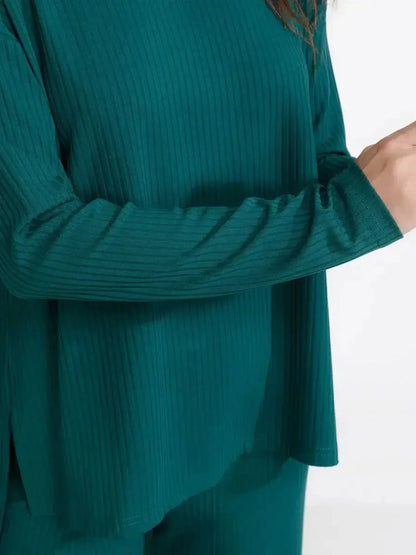 Close-up of the LoungeEase Set in dark green featuring a relaxed fit ribbed top for stylish comfort.