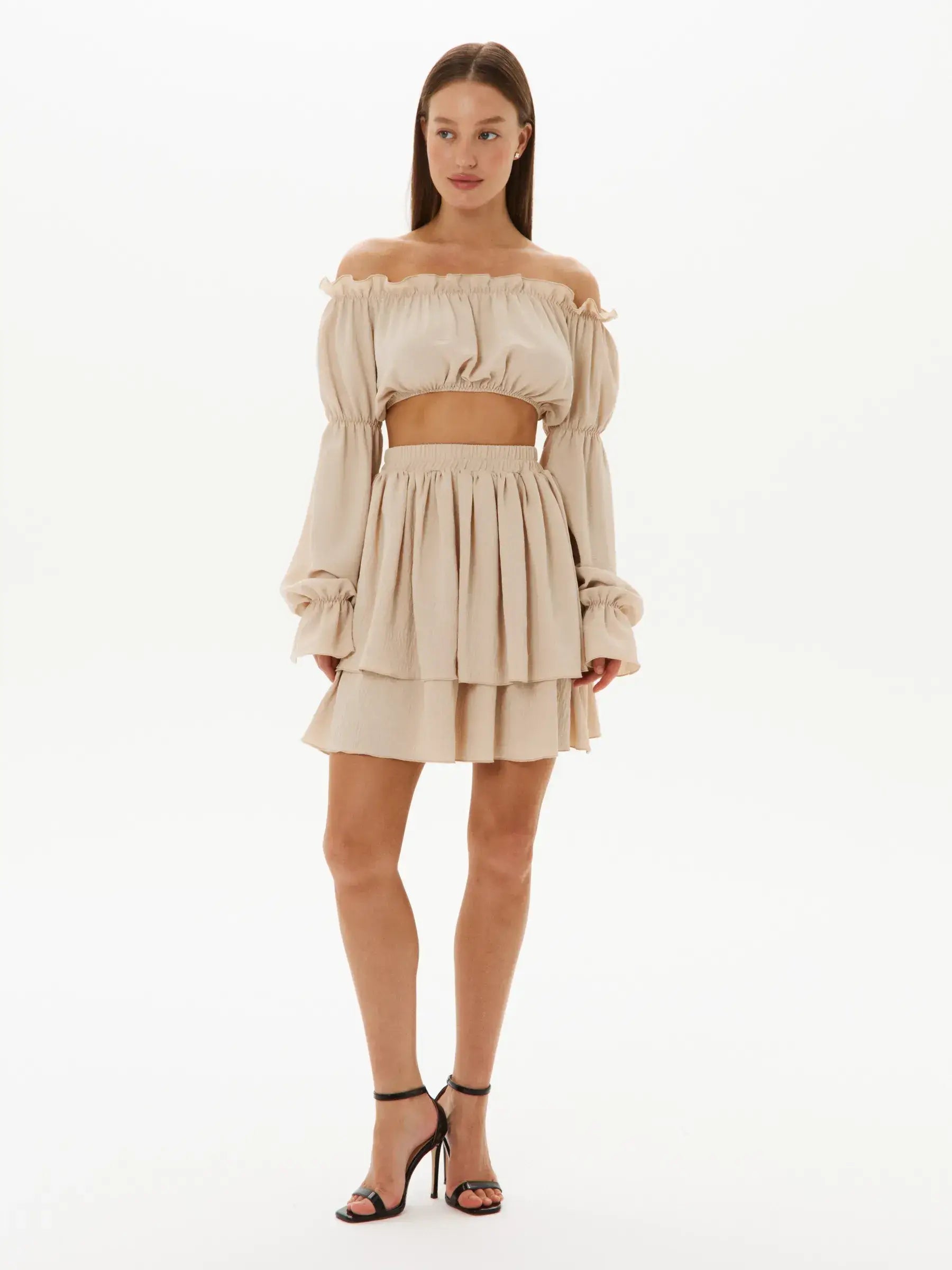 Ruffle Breeze Set featuring an off-shoulder crop top and tiered skirt in lightweight fabric, perfect for summer occasions.