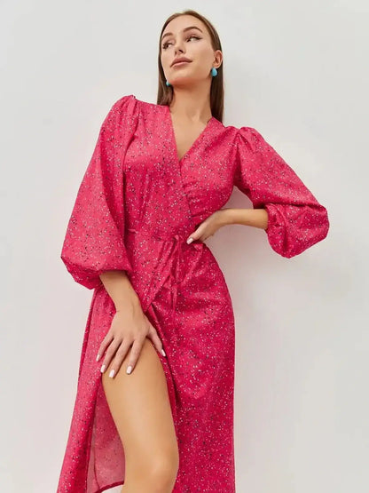 Vibrant pink Confetti Bloom Midi Dress with playful print, elegant wrap silhouette, and long sleeves.