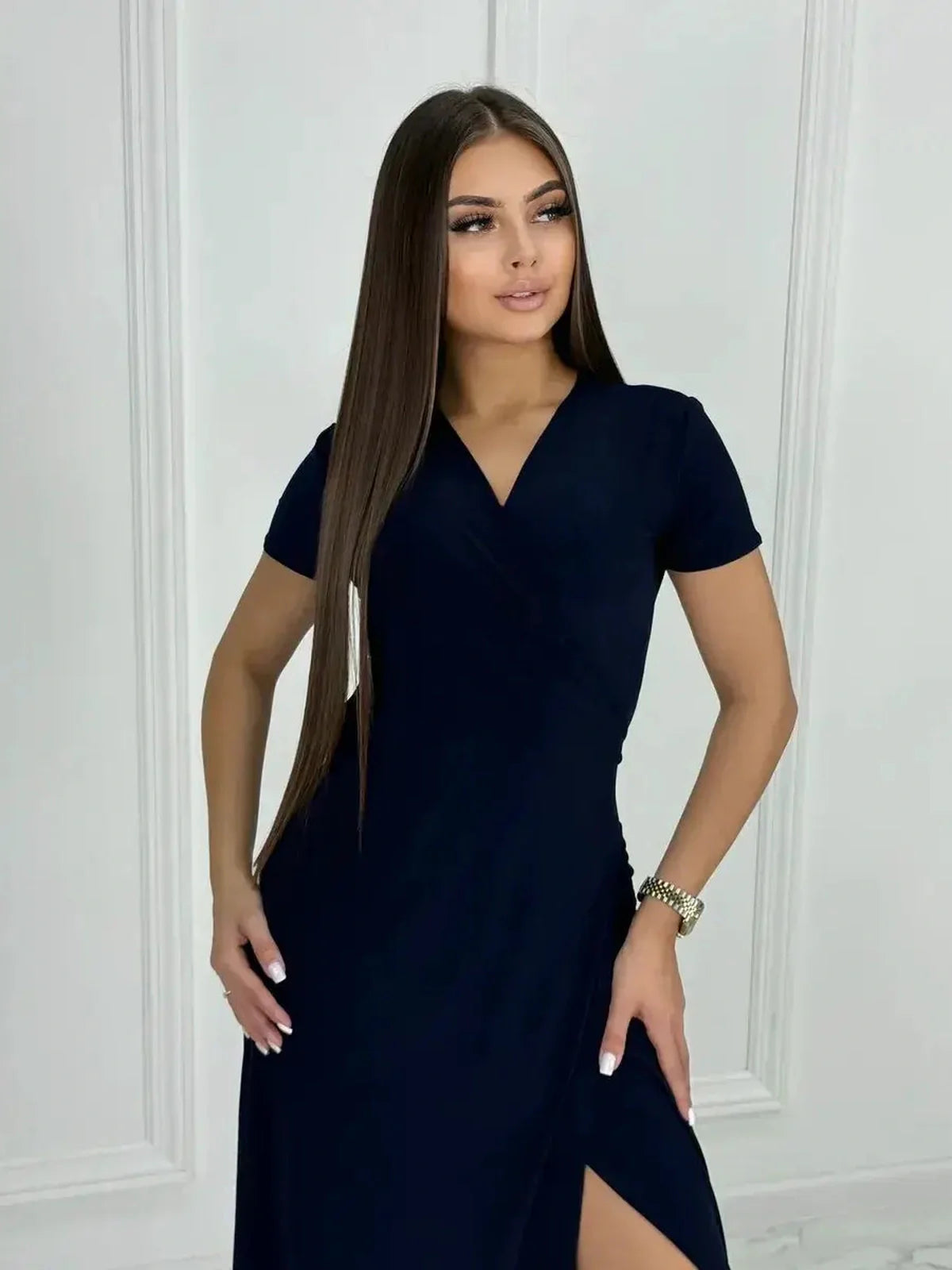 Eclipse Maxi Dress featuring a sleek wrap bodice and thigh-high slit, perfect for cocktail parties and summer occasions.