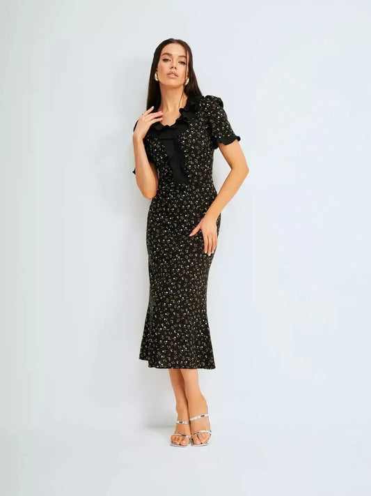 Midi Dress Nocturne Bloom featuring elegant ruffle details and floral print, perfect for weddings and special occasions.