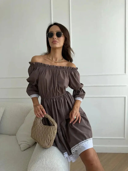 Mocha Muse off-shoulder mini dress with white ruffle trim, perfect for summer weddings or casual outings.