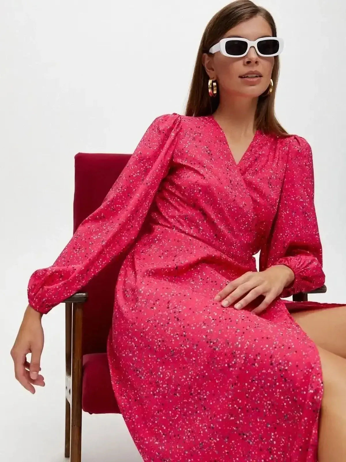 Confetti Bloom Midi Dress in vibrant pink with playful speckled print, perfect for weddings and summer parties.