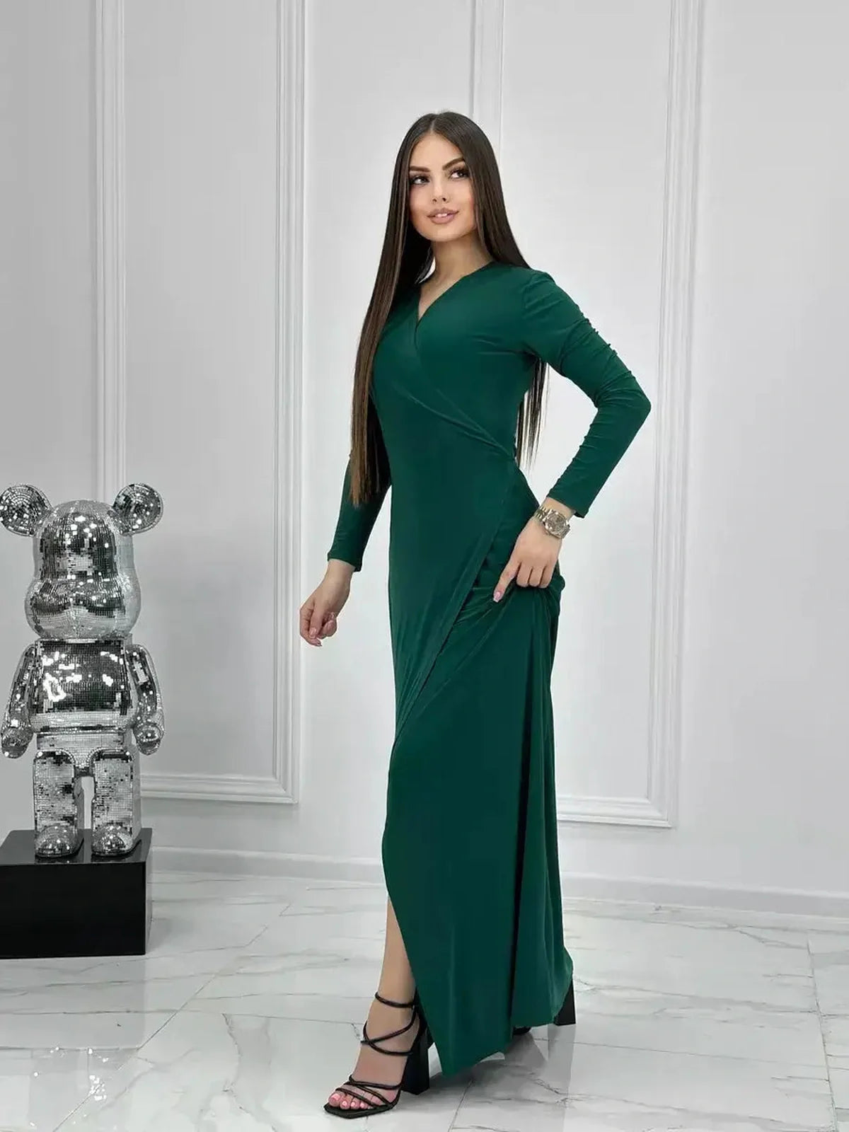 Emerald Allure Maxi Dress featuring a wrap silhouette and side slit, perfect for weddings and formal occasions.