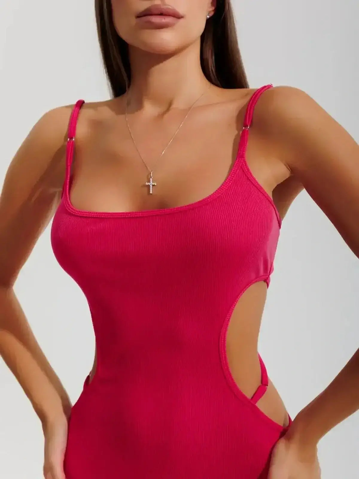 Sculpt Midi Dress in vibrant pink featuring contour cutouts and luxe ribbed fabric, ideal for summer and cocktail occasions.