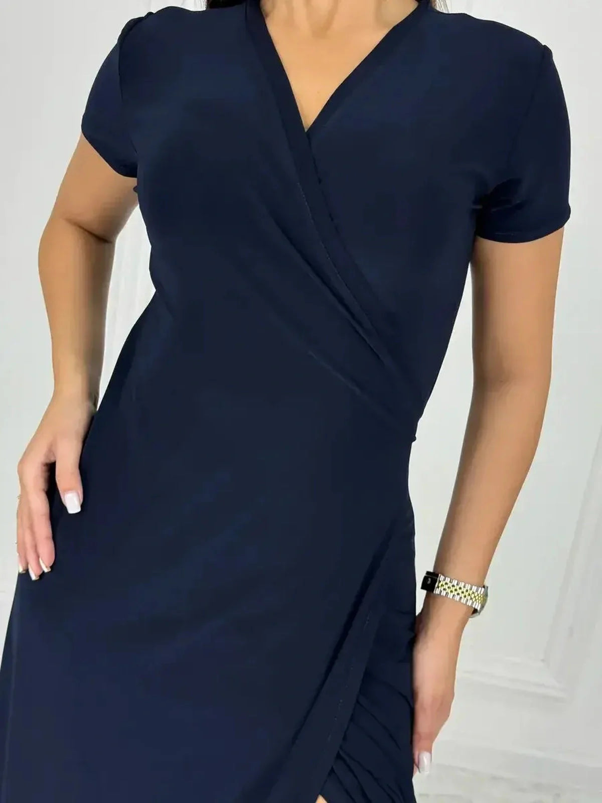 Eclipse Maxi Dress featuring a sleek wrap bodice and side slit, perfect for summer events and cocktail parties.