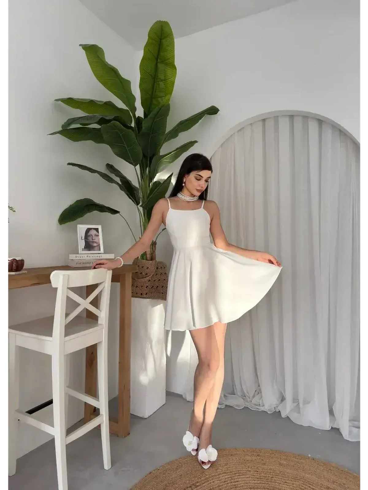 Elegant white summer dress with lace back, perfect for weddings, graduations, and formal occasions.