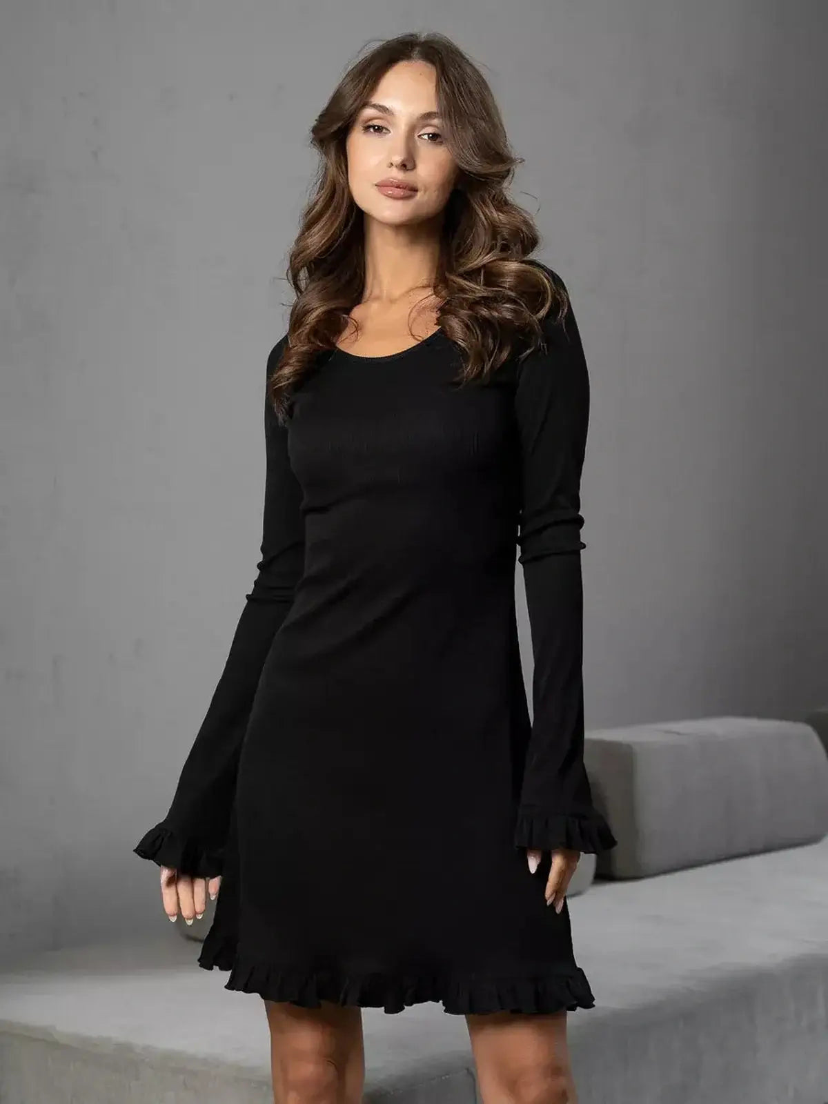 Elegant black mini dress with ruffled trim and long sleeves, perfect for weddings, proms, and casual summer outings.