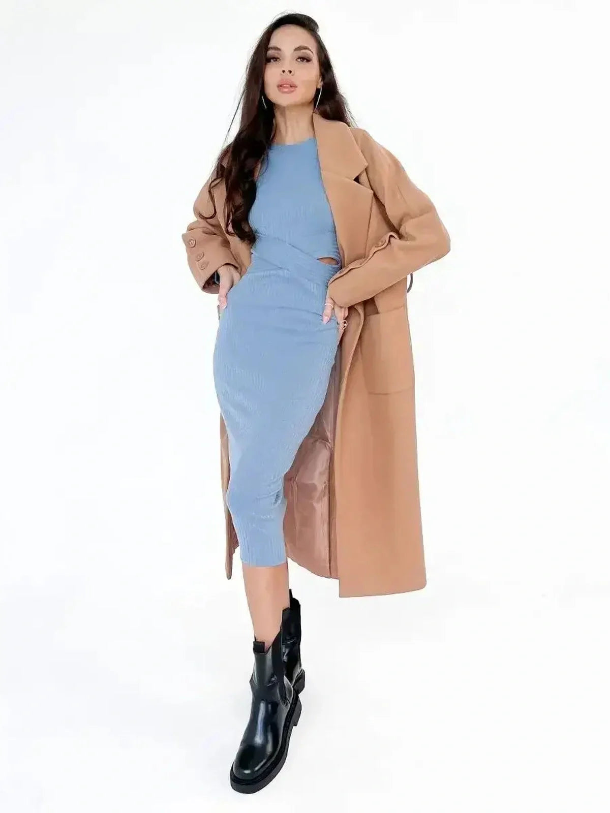 Model showcasing the Slate Allure Midi Dress in slate blue, paired with a chic trench coat and stylish black boots.