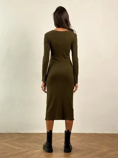 Back view of the Verona Midi Dress in olive green, showcasing its body-skimming ribbed design and long sleeves.