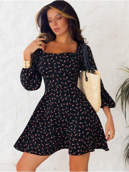Rose Noir mini dress featuring puffed long sleeves, square neckline, and floral print, perfect for weddings and summer occasions.