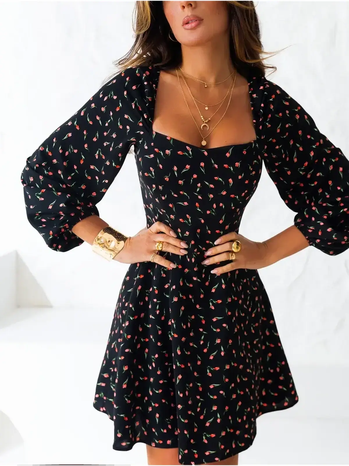 Rose Noir mini dress in black with floral print, puffed long sleeves, and a flattering square neckline for women.