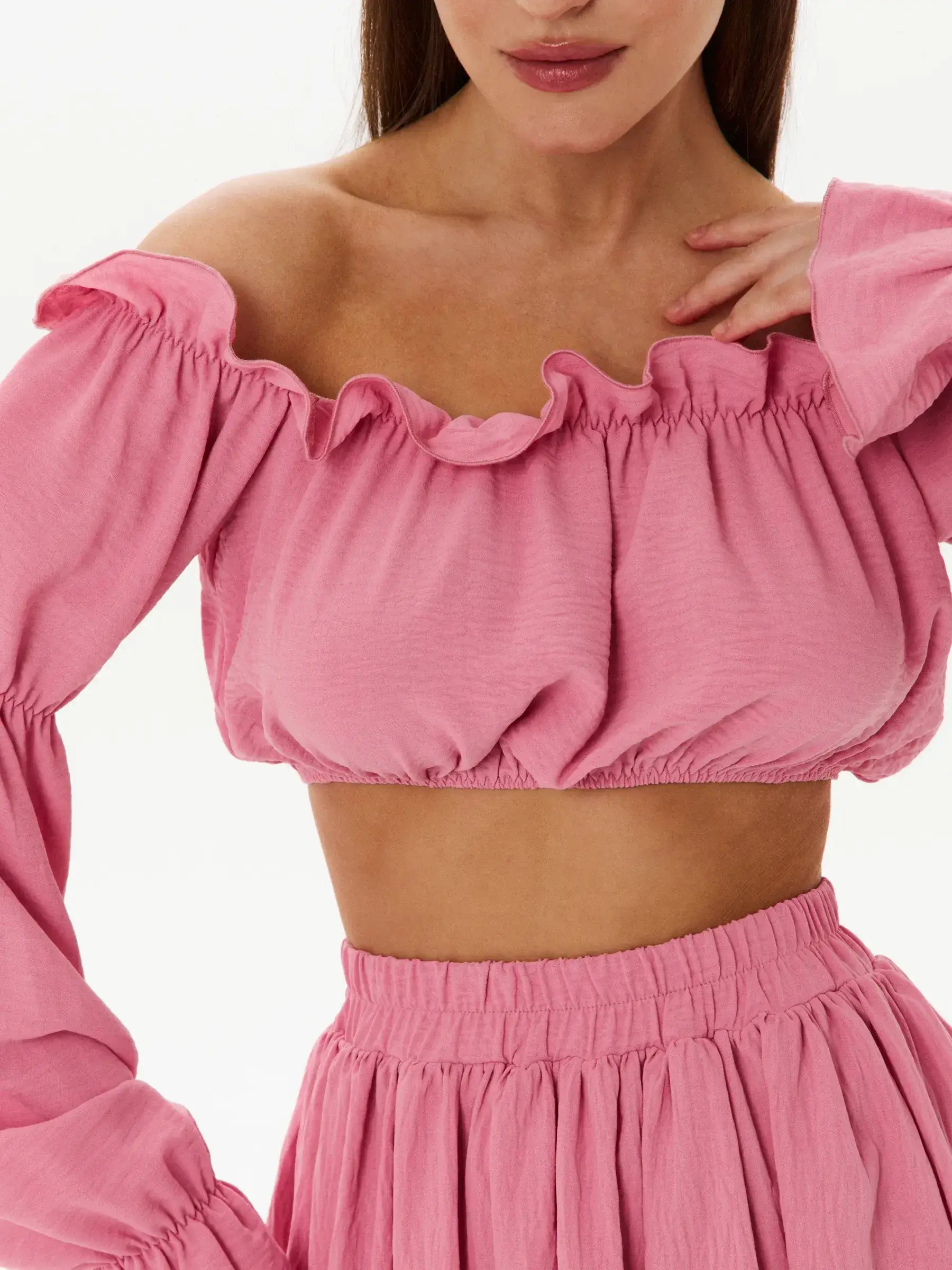 Off-shoulder pink crop top with ruffle details, part of the Tiered Ruffle Set, perfect for summer dresses and special occasions.