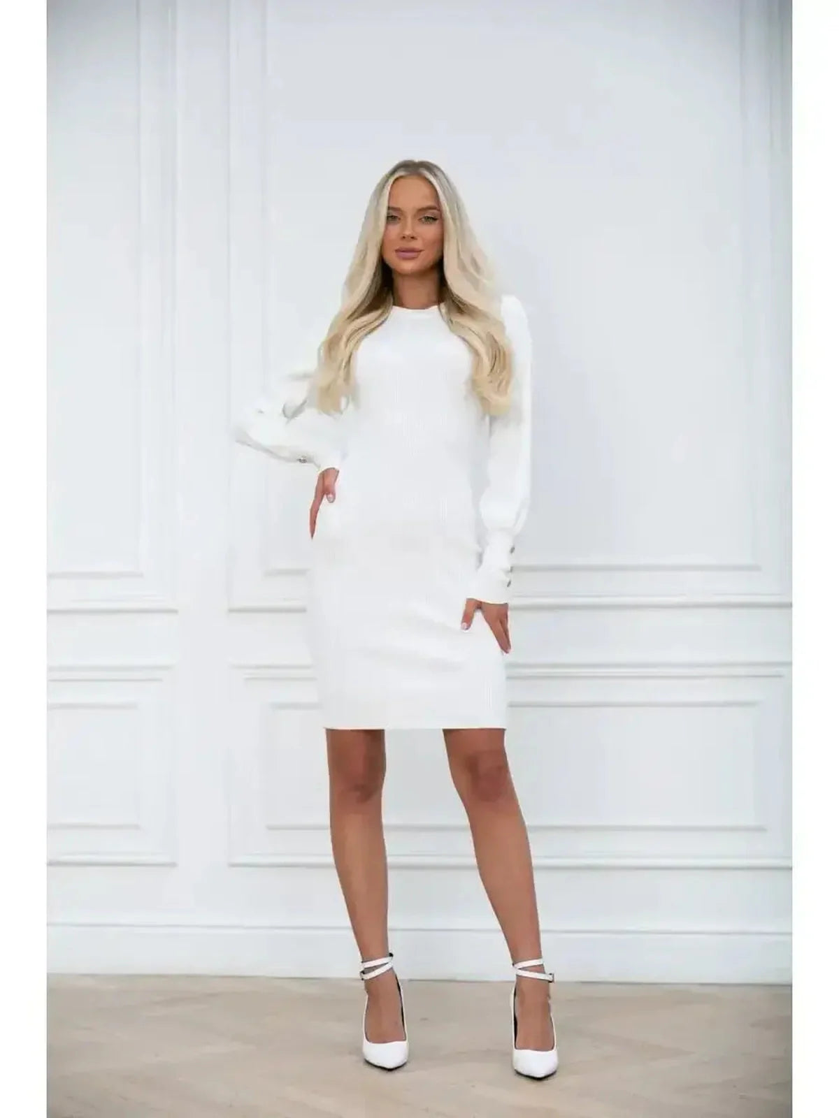 Ivory Curve: Elegant white mini dress with long voluminous sleeves, perfect for weddings or formal occasions.