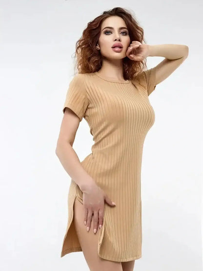 Soft Edge mini dress in a nude ribbed knit, featuring short sleeves and bold side slits for summer comfort and style.