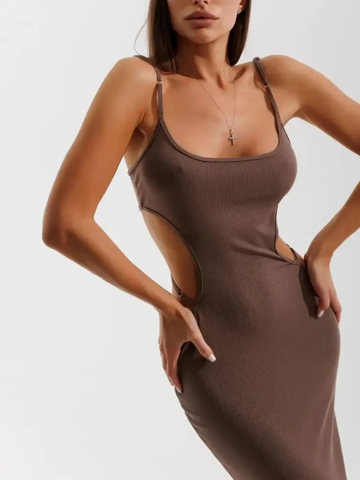 Obsidian Curve Midi Dress featuring cut-out design and form-fitting silhouette, ideal for summer and cocktail occasions.
