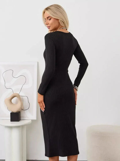 Muse Midi Dress in black, showcasing a ribbed knit design and sleek silhouette from the back, perfect for modern women.