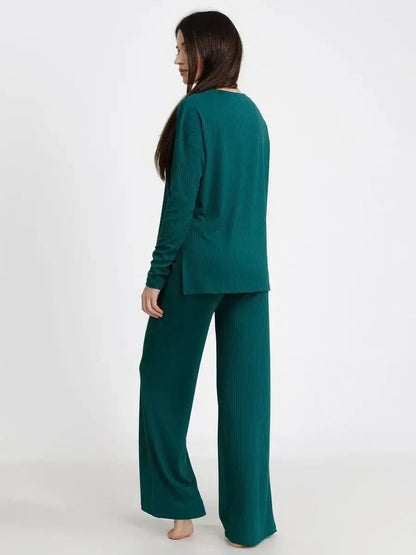 Back view of LoungeEase Set in dark green, featuring relaxed fit top and wide-leg pants, perfect for stylish lounging.