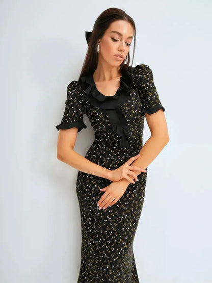 Elegant Midi Dress Nocturne Bloom featuring ruffles and floral print, perfect for weddings and formal occasions.