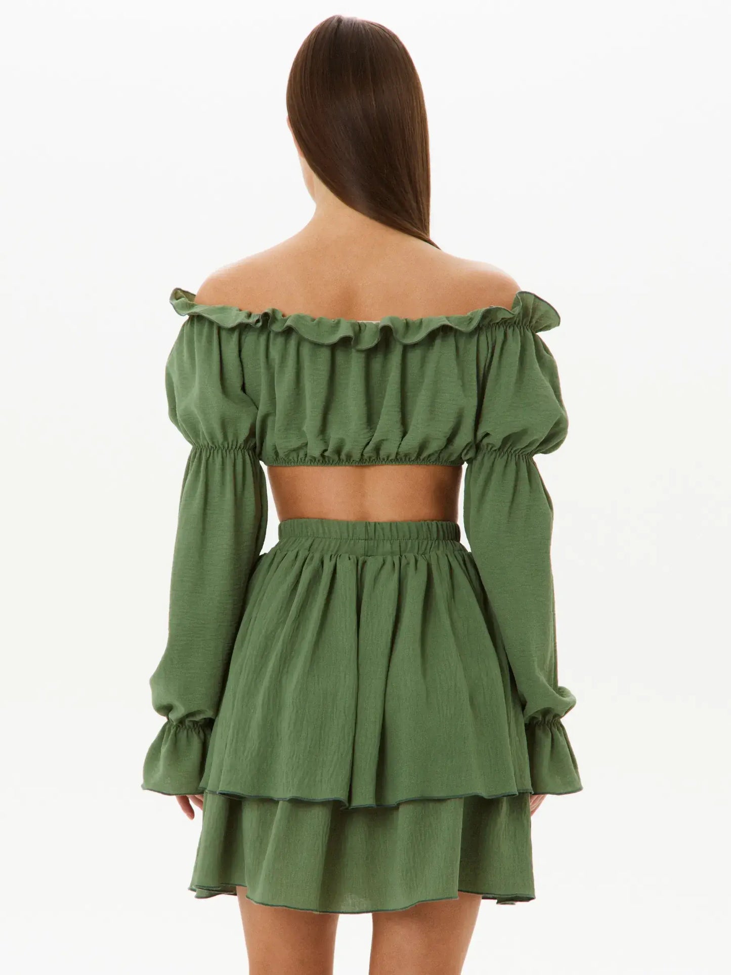 Back view of a tiered ruffle set featuring an off-shoulder crop top and a double-tiered mini skirt in khaki.