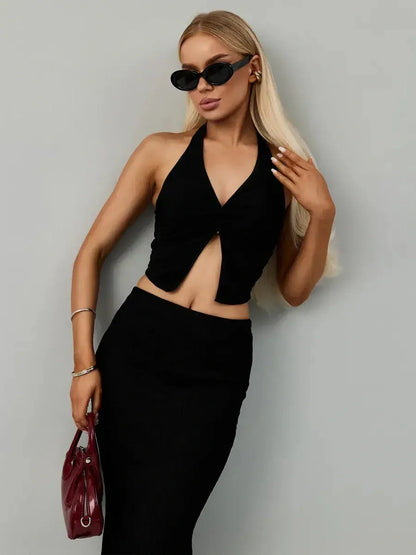 Noir Edge Set showcasing a black halter top and maxi skirt, perfect for weddings and formal events.