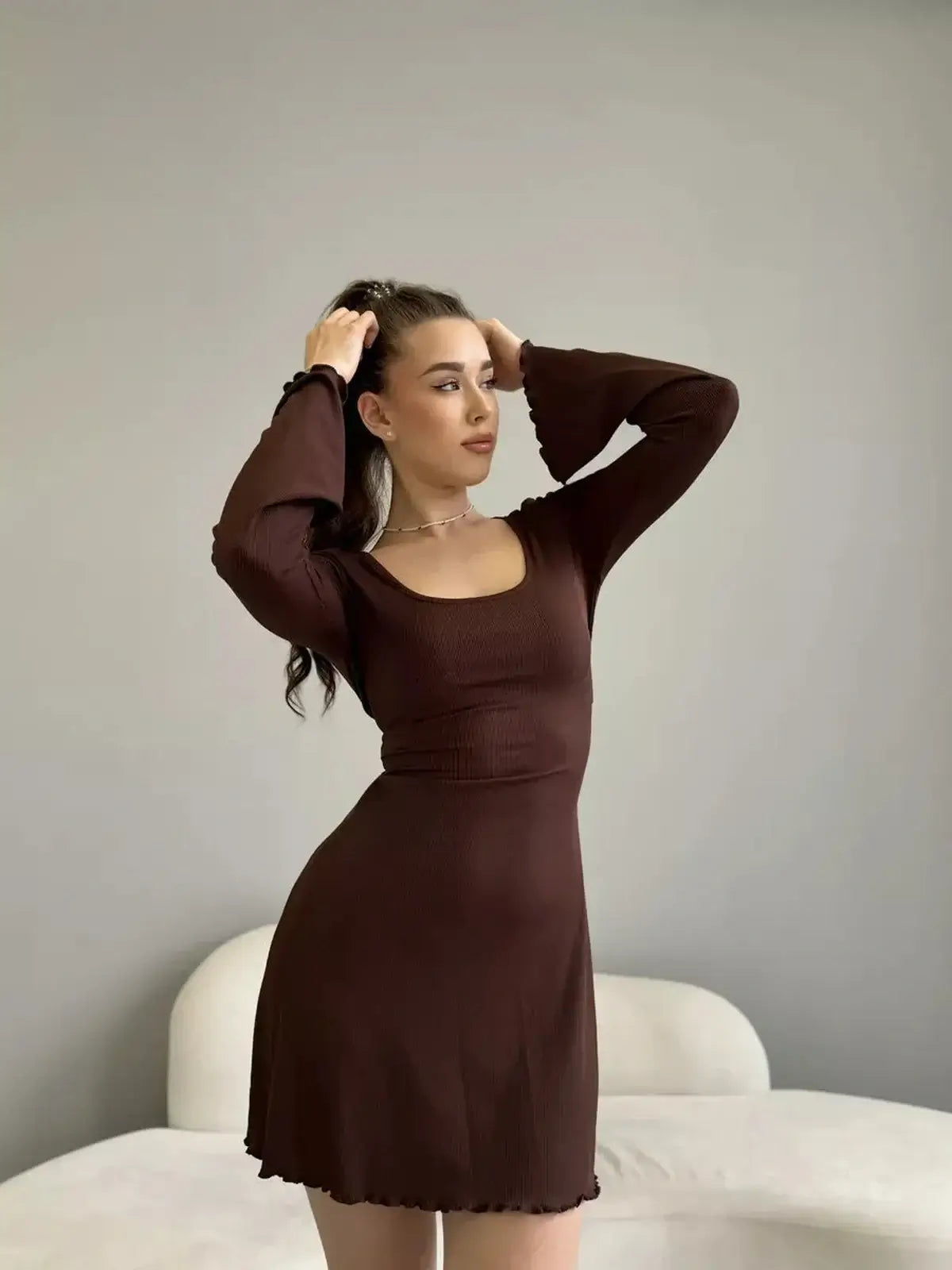 Mocha Muse mini dress in rich brown, featuring a scoop neckline and bell sleeves, perfect for stylish occasions.