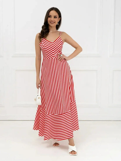 Maxi Dress Riviera Curve with red-and-white stripes, featuring a chevron pattern and a playful back bow tie.