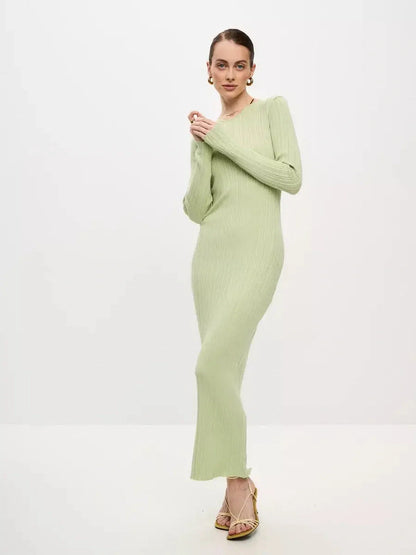 Celery Luxe Maxi Dress in light green ribbed knit, featuring long sleeves and a seamless silhouette, perfect for summer occasions.