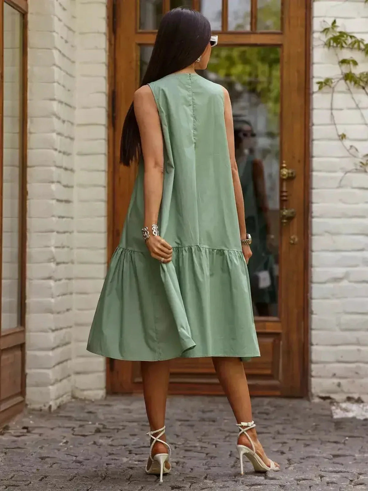 Petal Bloom Midi Dress in green, sleeveless with flared hem, perfect for women’s summer and formal occasions.