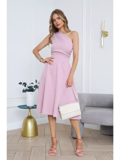 Model wearing a blush grace midi dress with one-shoulder design, styled for summer events or weddings.