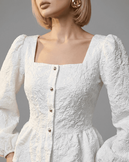 Ivory Corset Top by Slimona featuring square neckline, puff sleeves, and structured jacquard fabric in white.