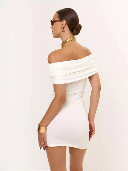 Back view of a stylish off-shoulder white midi dress, perfect for wedding guests or summer parties.