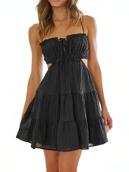 Black A-line midi dress with tiered ruffles and cutout sides, perfect for summer parties and weddings.