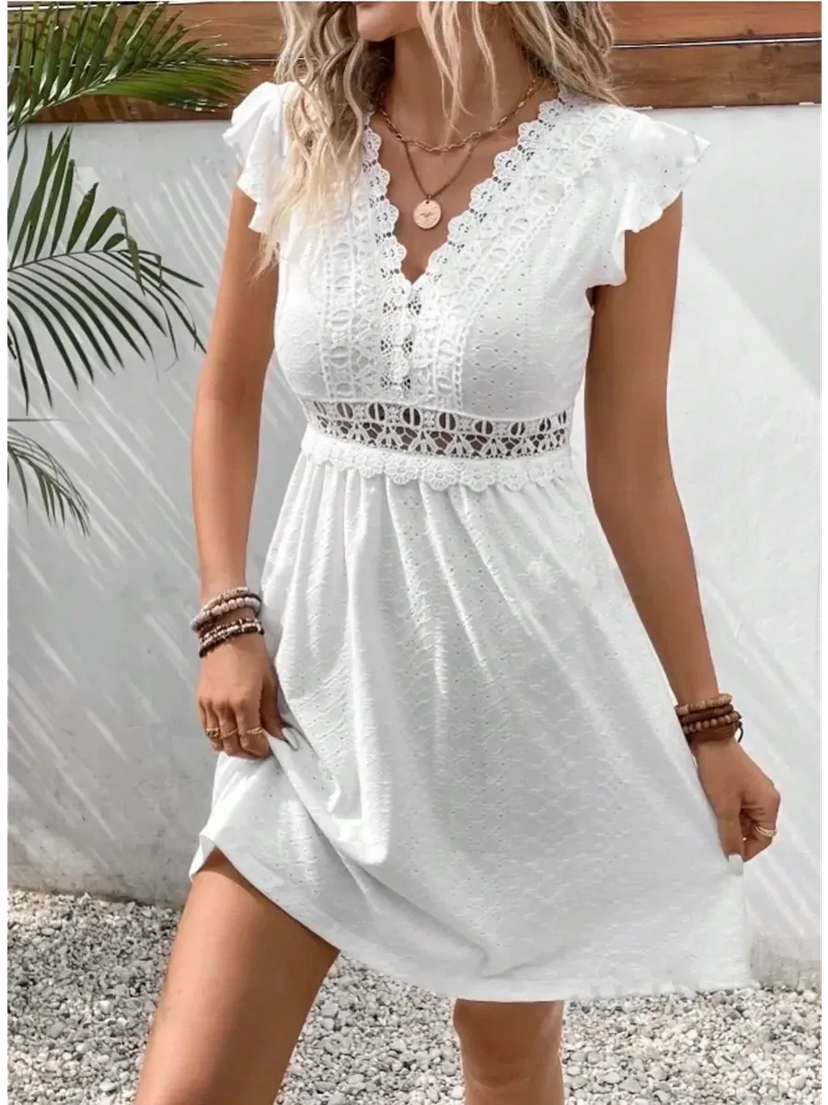 Lace Halo Mini Dress in white, featuring V-neckline and lace trim, perfect for summer weddings and casual outings.