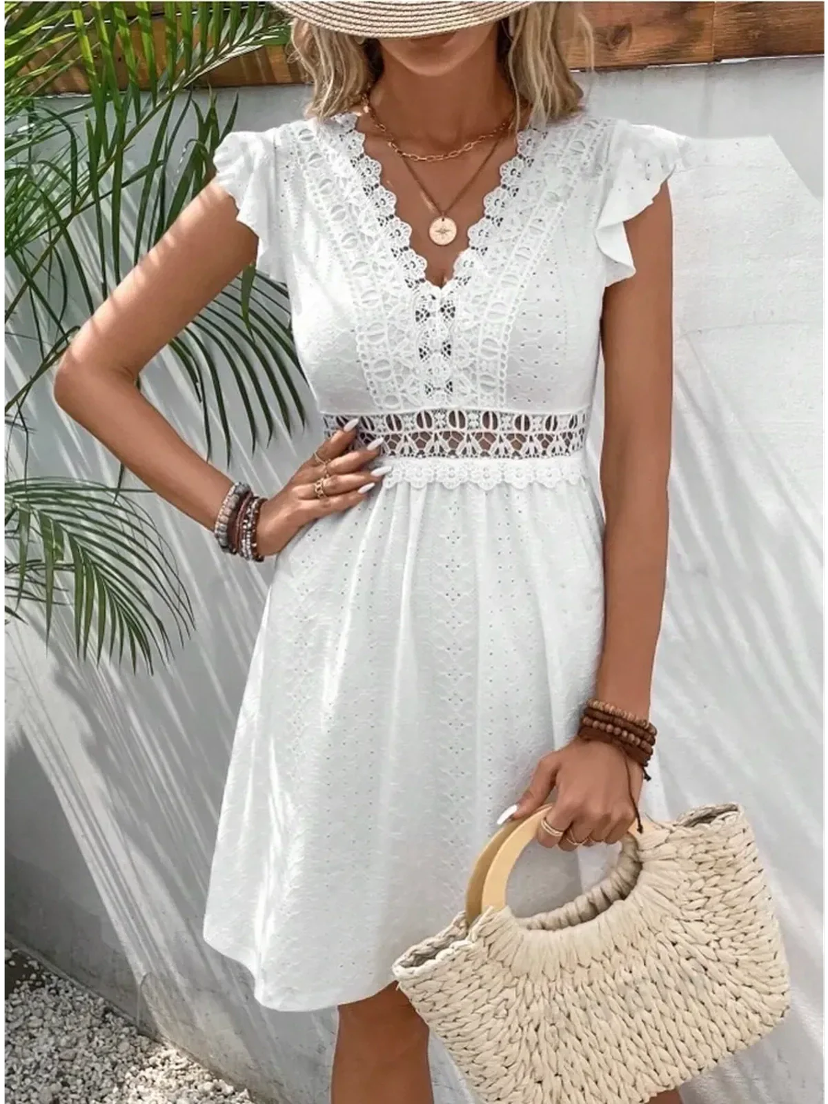 Lace Halo Mini Dress in white with flutter sleeves and lace trim, perfect for summer or wedding guest attire.