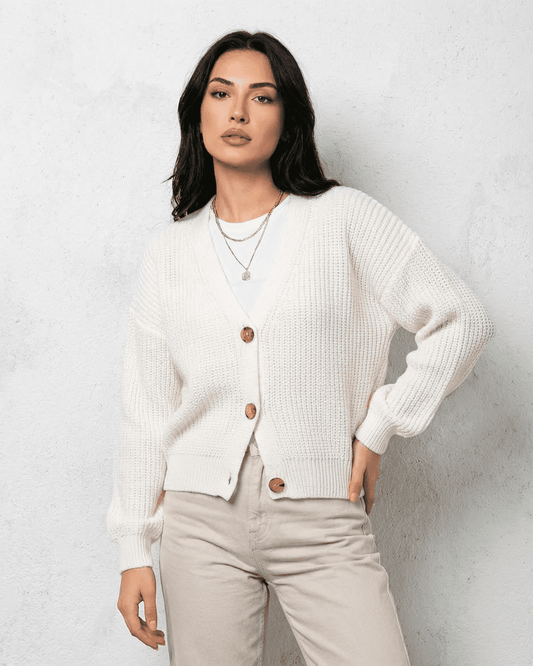 Alba Cardigan by Slimona - Classic white knitwear with soft V-neck design and button details for cozy layering.