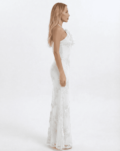 Alba Maxi Dress by Slimona, elegant halter neck design with 3D floral detail in white, showcasing a sleek silhouette.