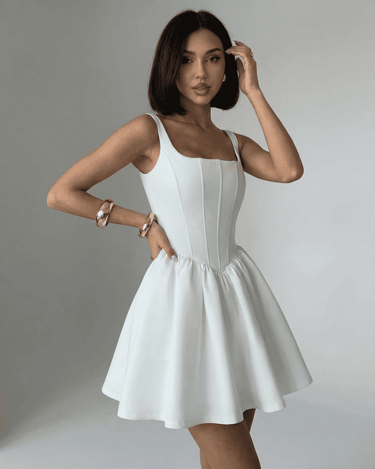 Alba Mini Dress by Slimona, a pure white structured corset mini with a square neckline and sculpted silhouette.