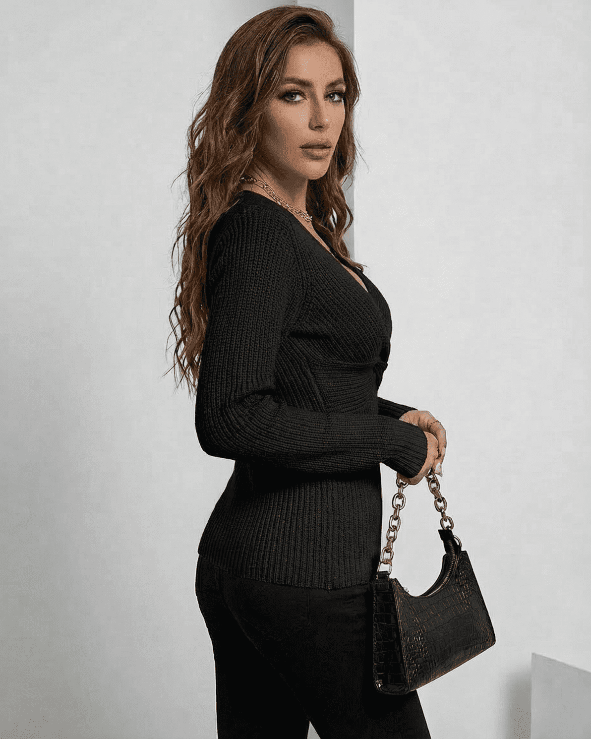 Alina Pullover by Slimona in sleek ribbed design, showcasing a slim fit V-neck sweater in elegant black.