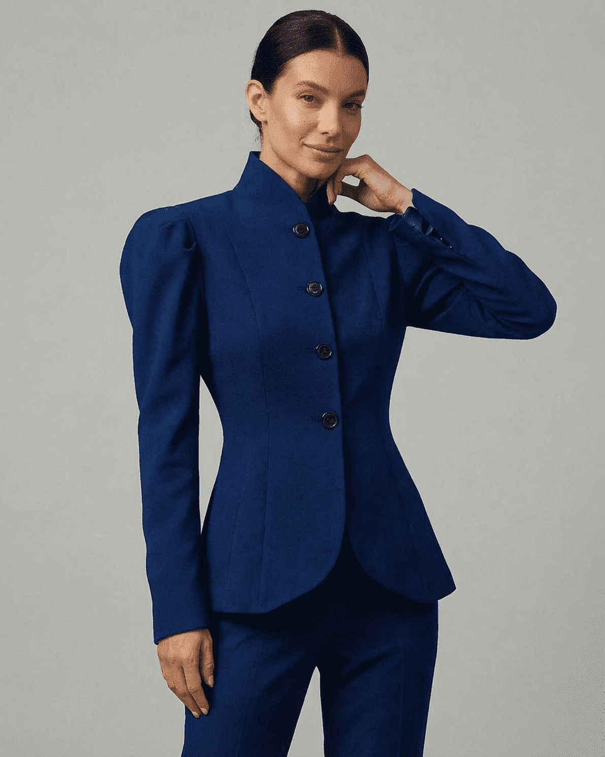 Bleuette Blazer by Slimona featuring stand collar and structured puff sleeves, exuding elegance and sophistication.