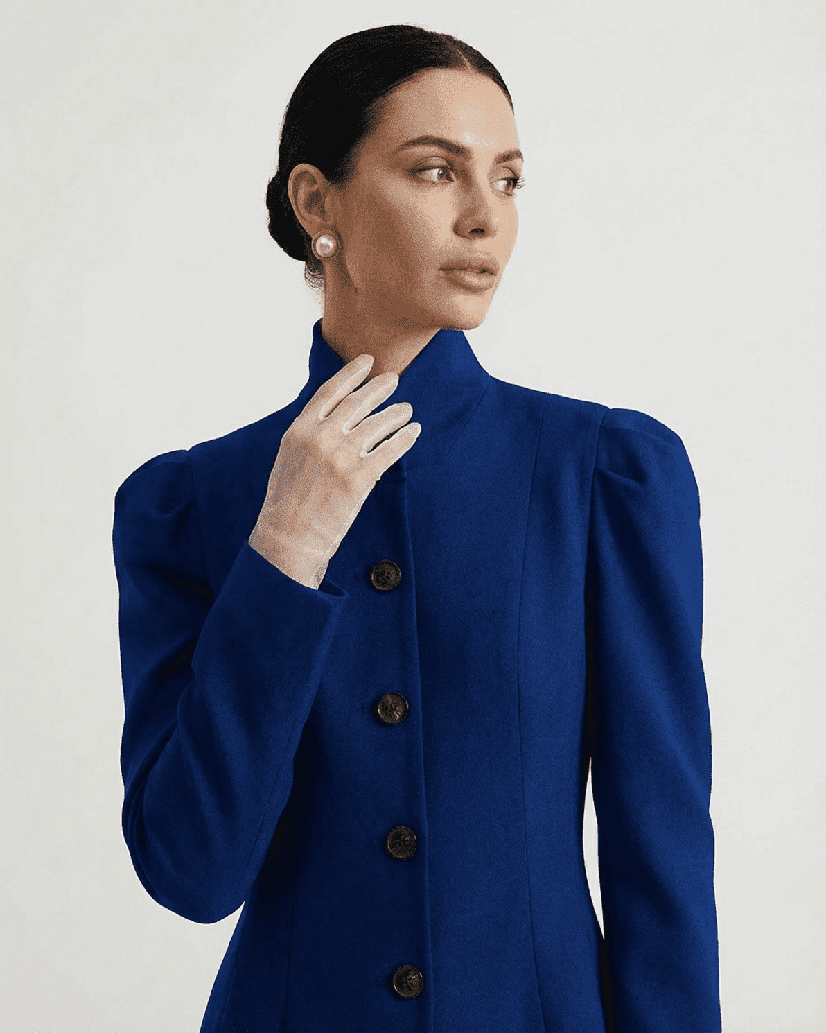 Slimona Bleuette Blazer with refined stand collar and puff sleeves, showcasing sophisticated style and tailoring.