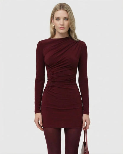 Bordeaux Mini Dress by Slimona, featuring long sleeves, high waist, and soft applique detail, in deep wine tone.