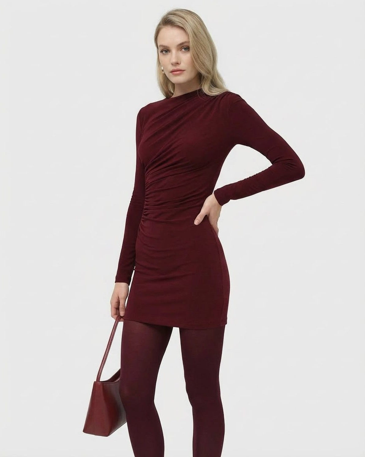 Bordeaux Mini Dress by Slimona, featuring long sleeves, high waist, and soft applique detail in deep wine color.