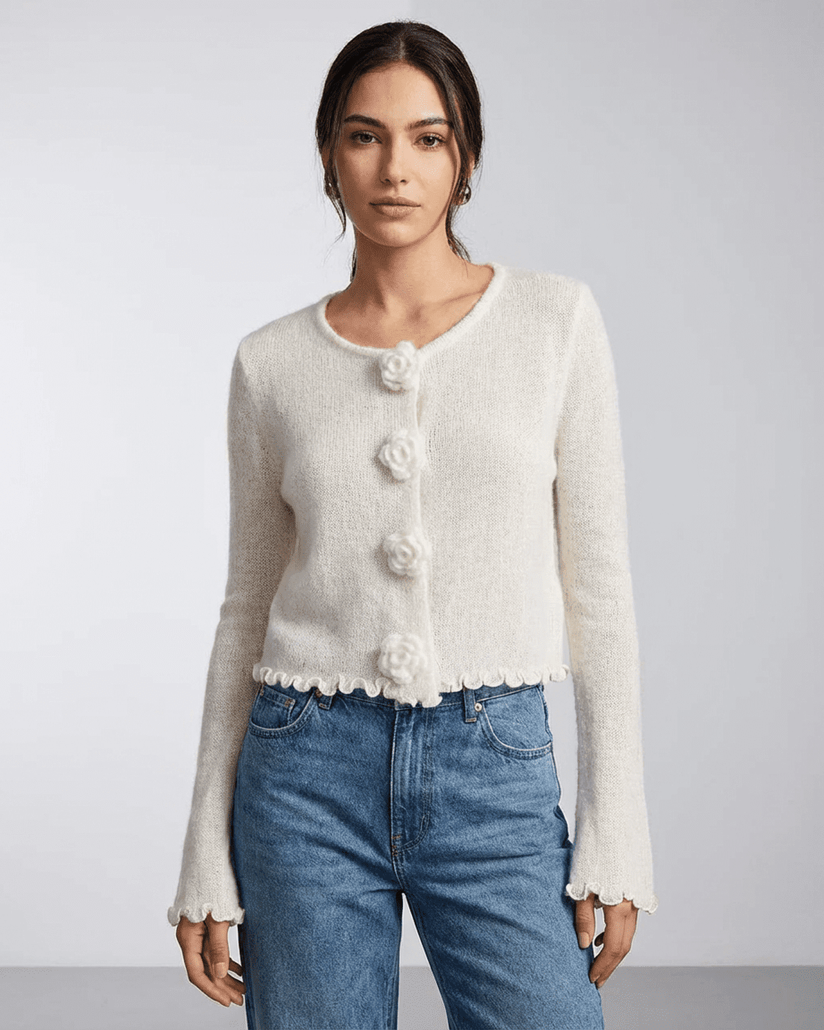 Camellia Cardigan by Slimona featuring floral buttons and a soft knit texture, ideal for modern styling.