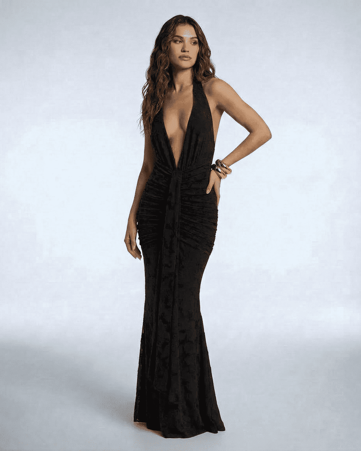 Celeste Maxi Dress by Slimona, elegant black sleeveless gown with deep V-neckline and ruched detail, perfect for special occasions.