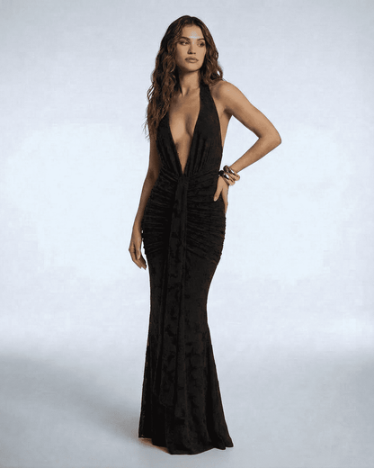 Celeste Maxi Dress by Slimona, elegant black sleeveless gown with deep V-neckline and ruched detail, perfect for special occasions.