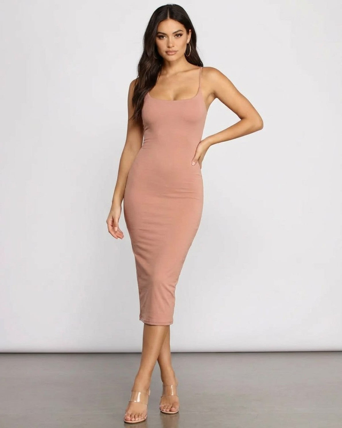 Celeste Midi Dress by Slimona, showcasing a curve-hugging silhouette in elegant knitwear.