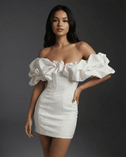 Celeste Mini Dress by Slimona featuring dramatic ruffle trim and boned structure for a sleek fit.