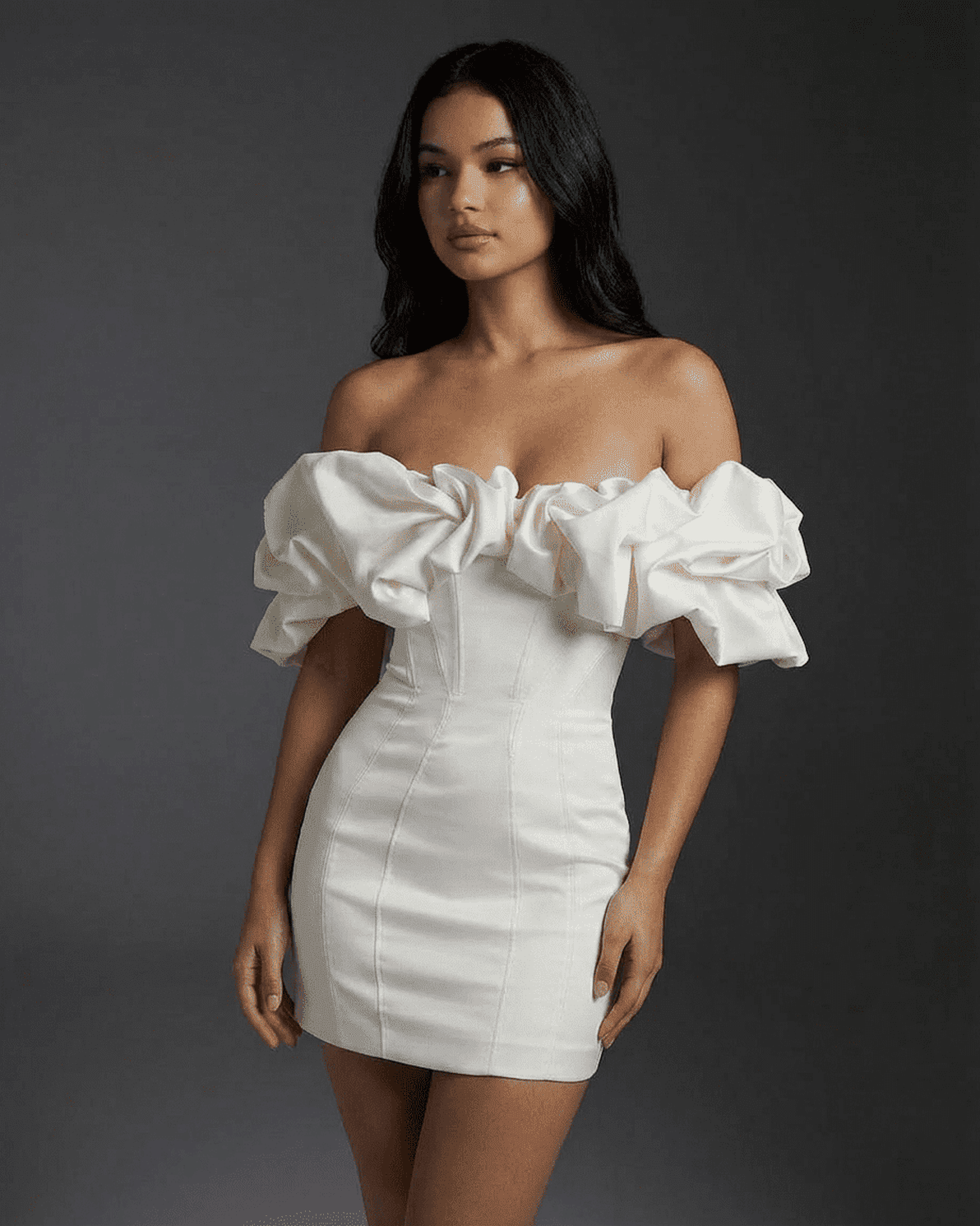 Celeste Mini Dress by Slimona, featuring off-the-shoulder design, ruffle trim, and bodycon silhouette.