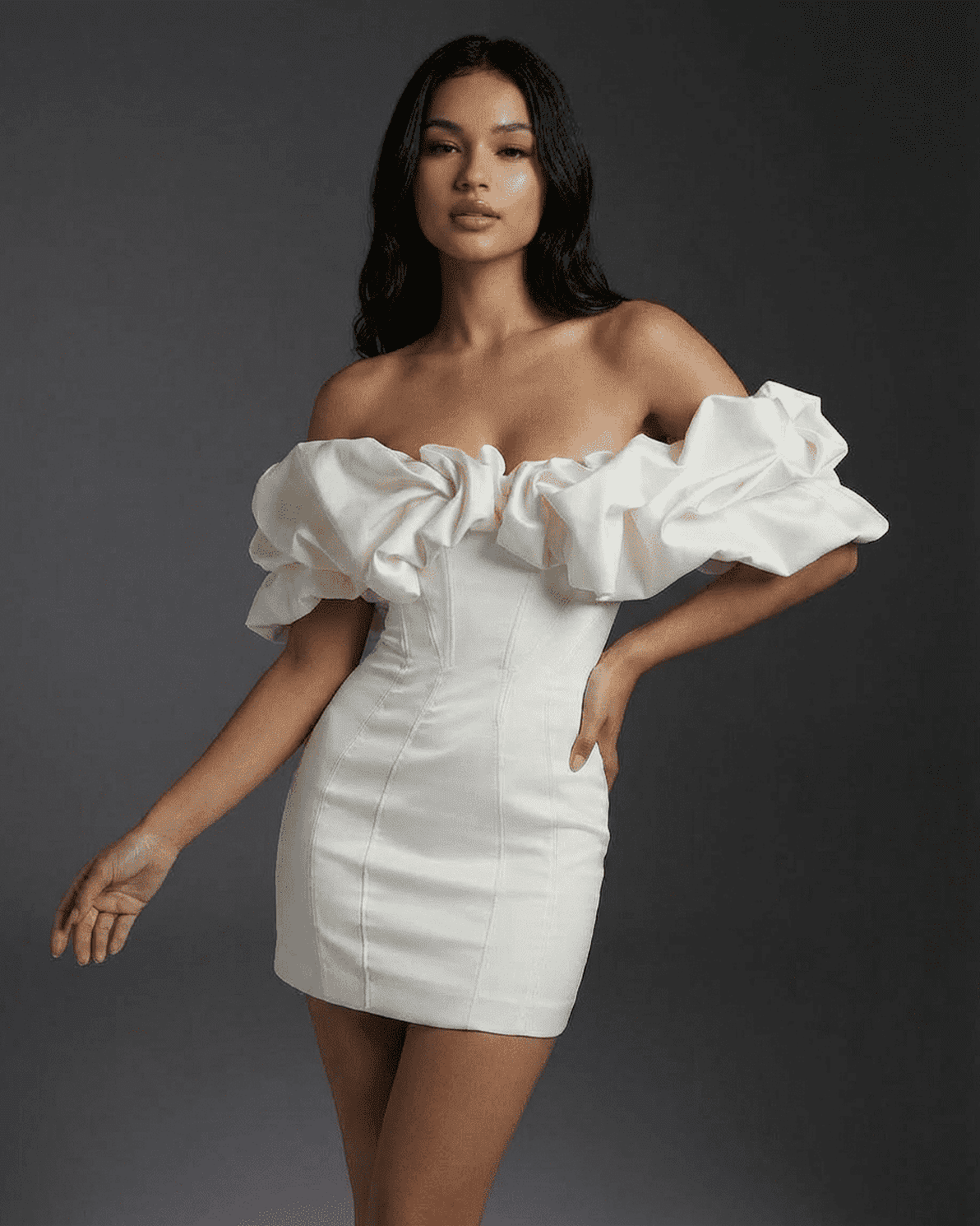 Celeste Mini Dress by Slimona featuring off-the-shoulder design and dramatic ruffle trim for a stylish look.